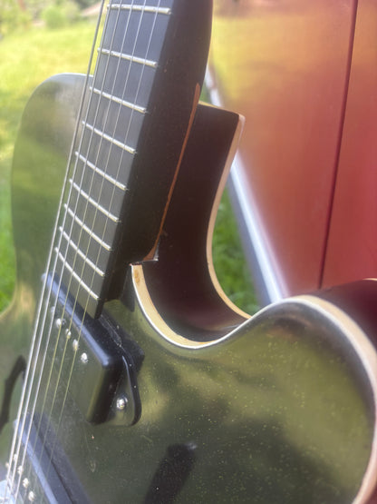 ‘60’s Harmony Rocket/Silvertone 1446 of OSG lore.